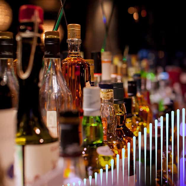 Alcohol bottles on a bar