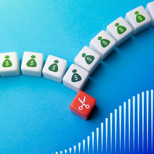 Tiles with money bags on them with a red tile with scissors on them