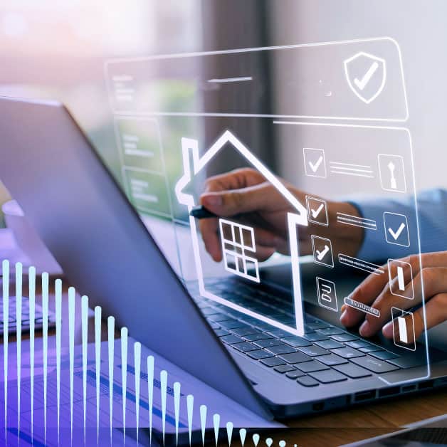 Person typing on laptop with floating house icon above it