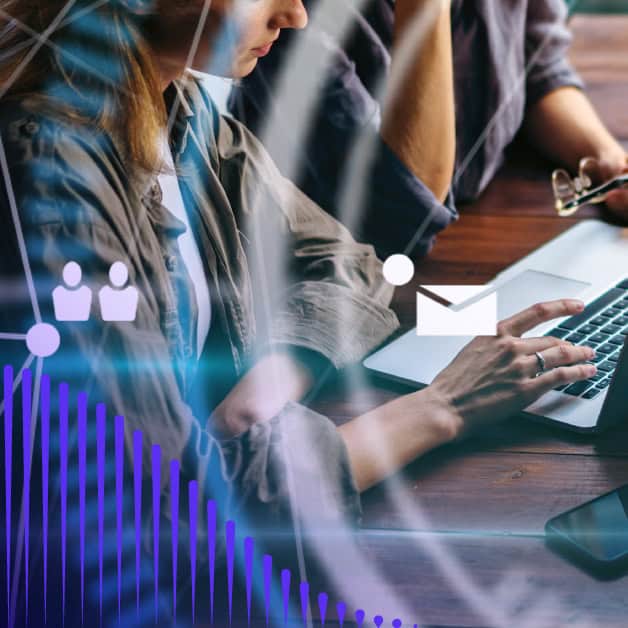 Woman typing on laptop