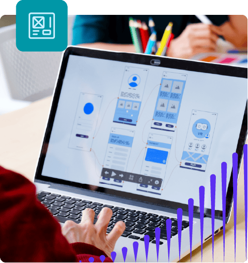 A person's hand uses the trackpad on a laptop, which displays a screen that depicts app design