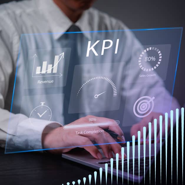 Typing on computer with floating KPI screen