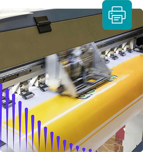 An industrial printer is printing out a yellow graphic or sign.